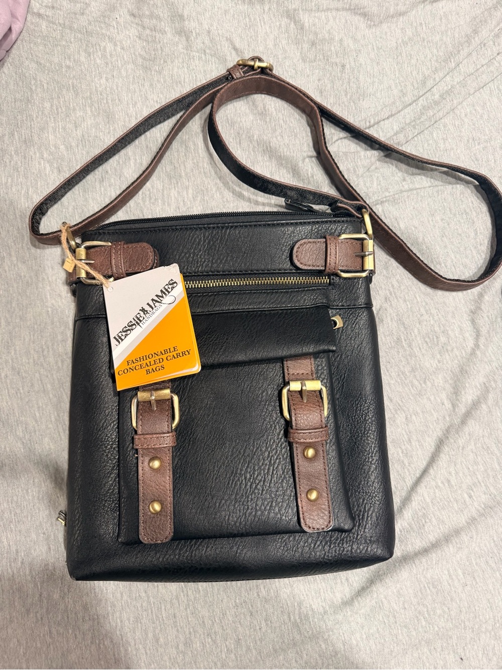 Jessie & James Black Messenger Bag with Brown Accents
